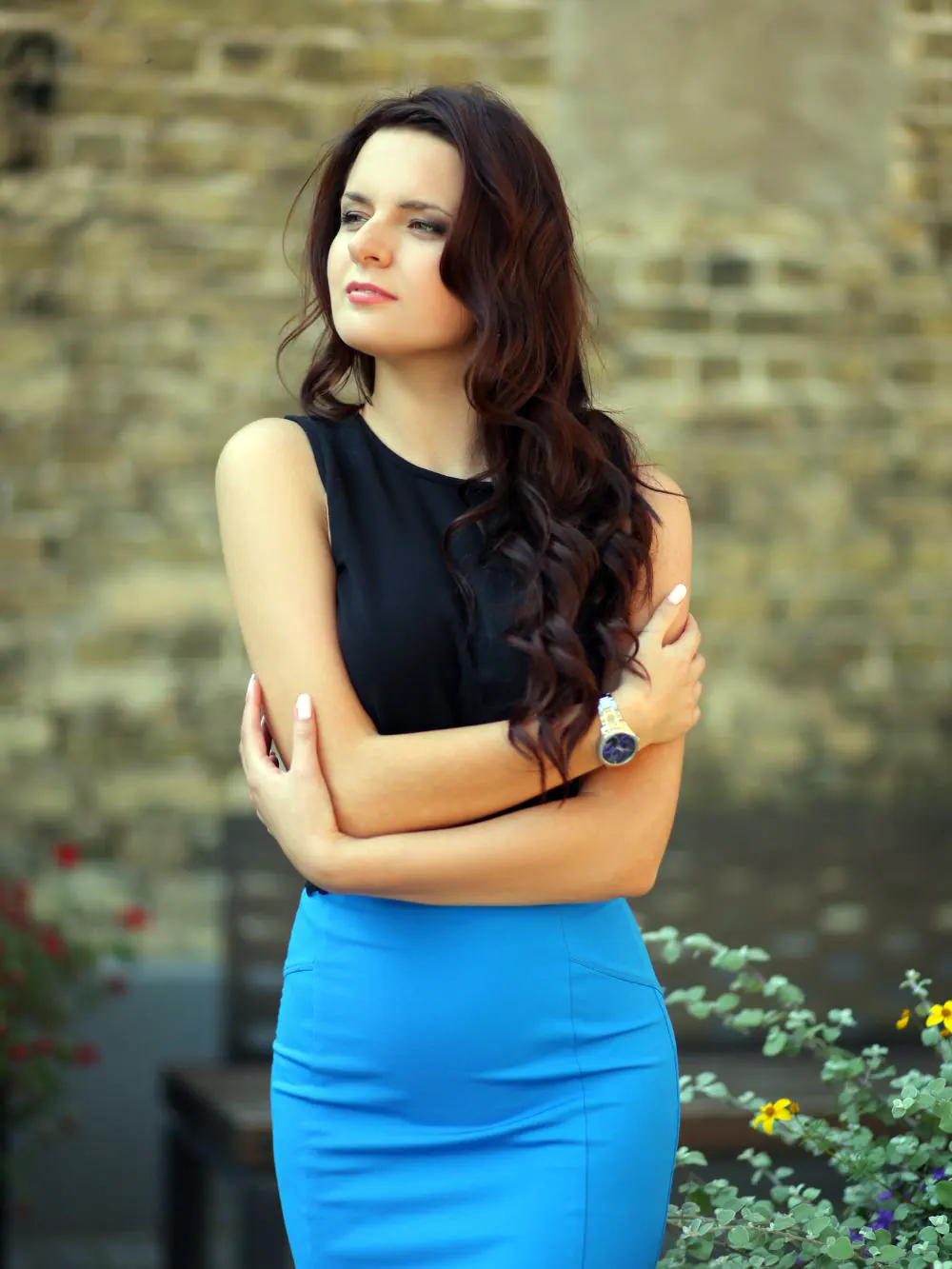 Girl wearing cool blue skirt and black blouse