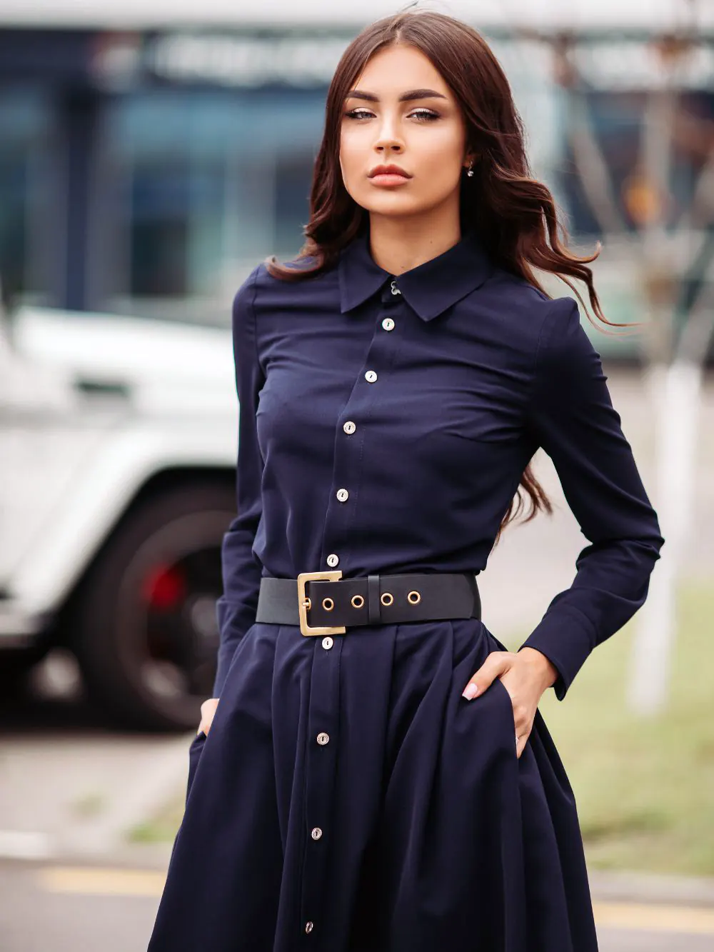 Black dress with pockets and belts