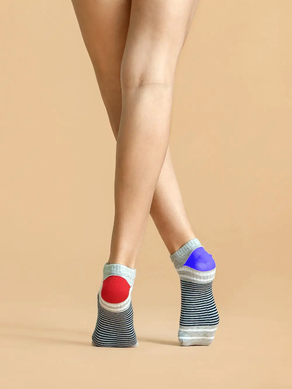 Girl wearing two different socks