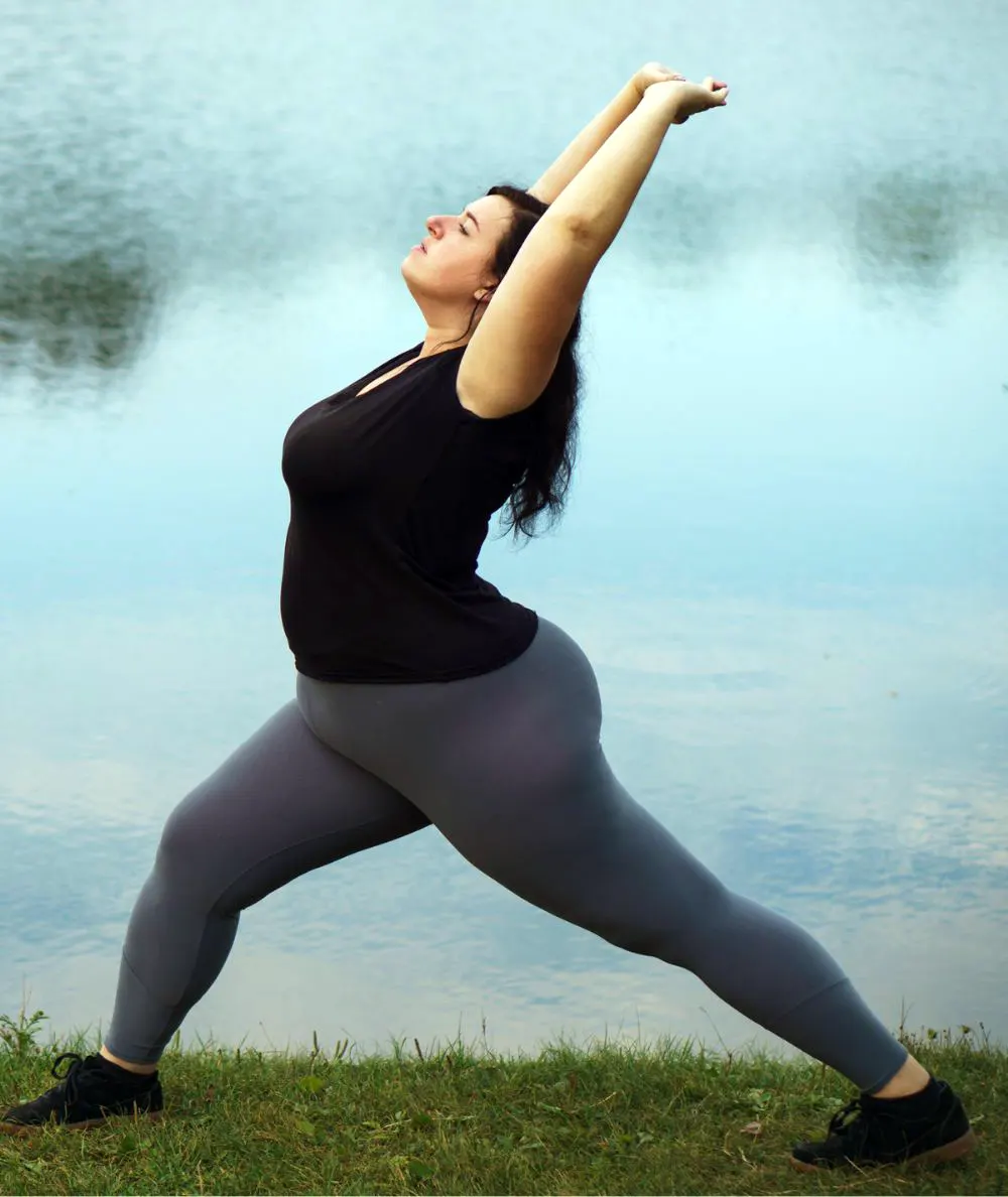 Girl doing yoga wearing gray yoga pant