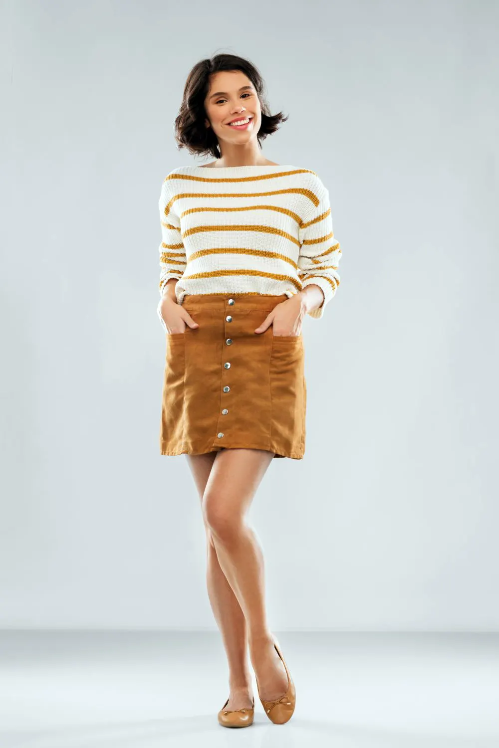 Girl wear a brown short skirt