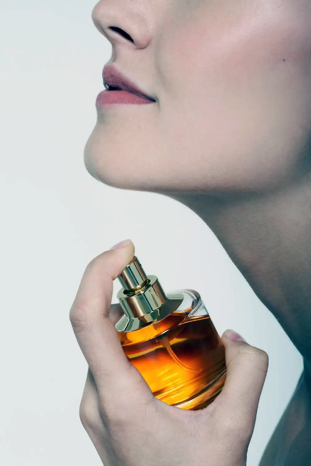 Female with perfume bottle