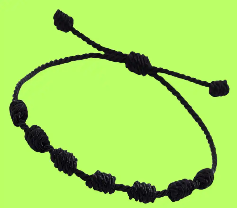 Black thread with 9 knots
