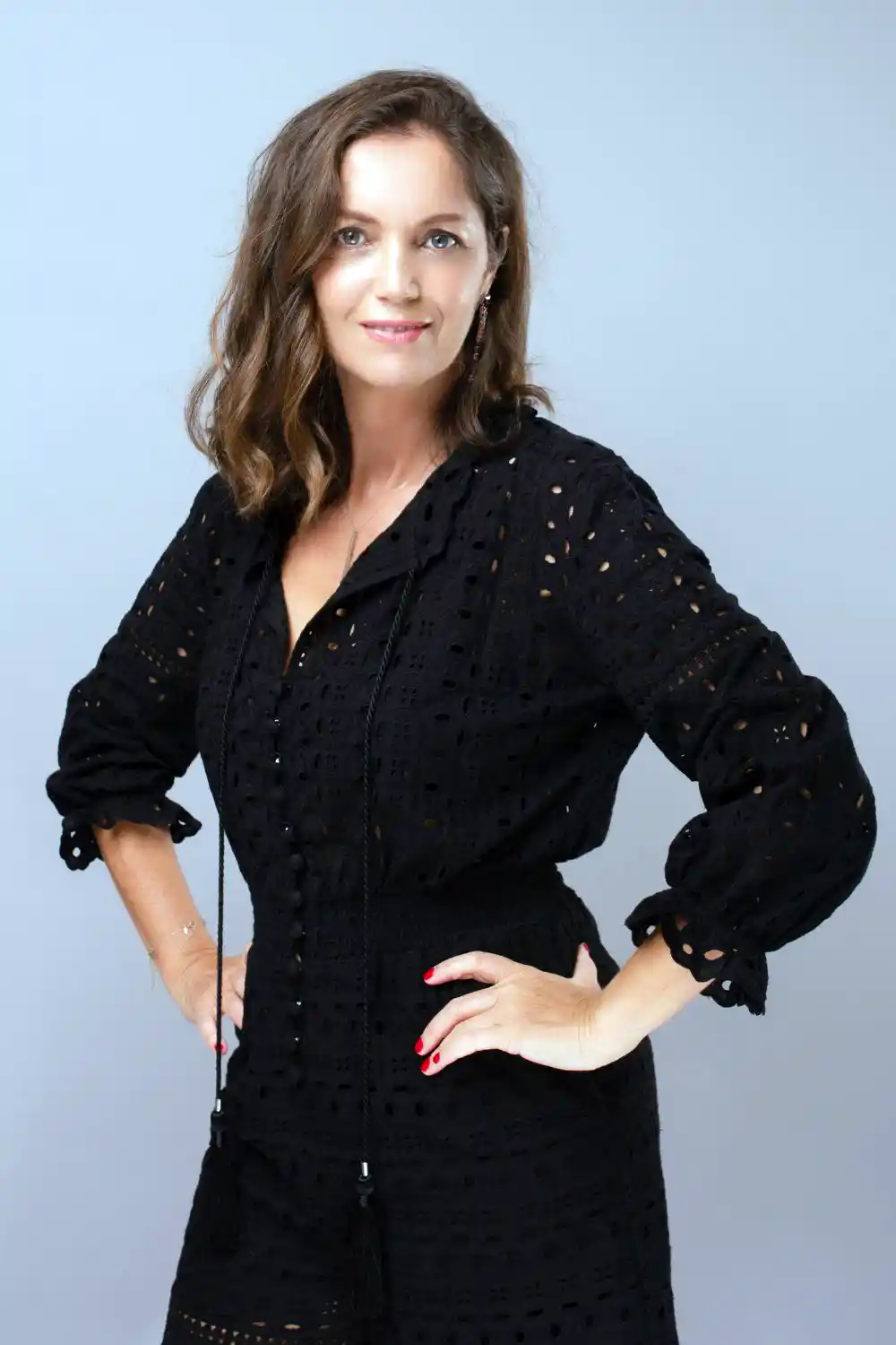 Female Journalist in Black Long Sleeve Dress