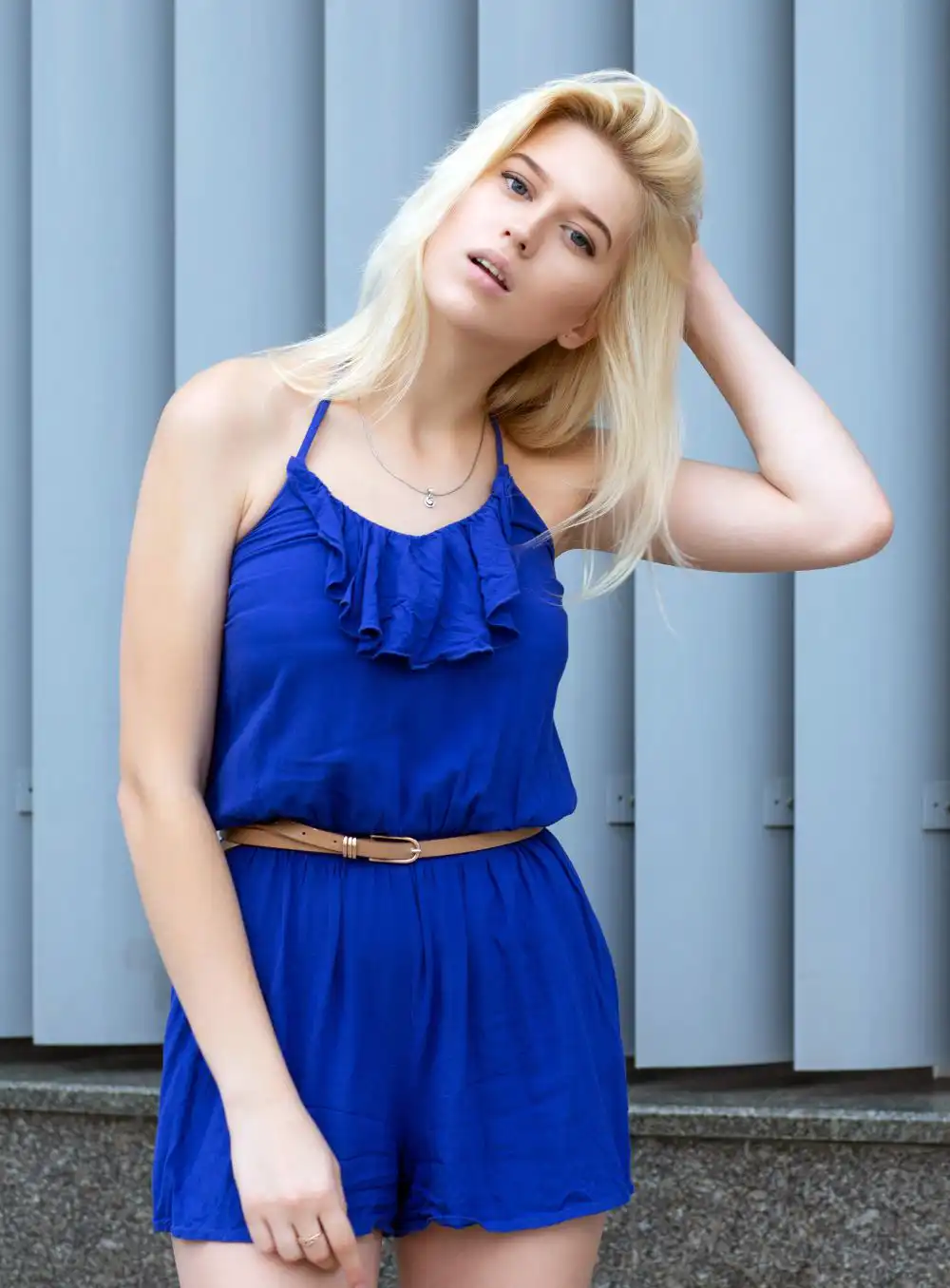 Blonde woman in fashionable romper