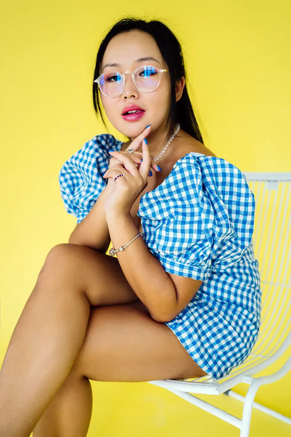 Woman in Blue and White Checkered Romper