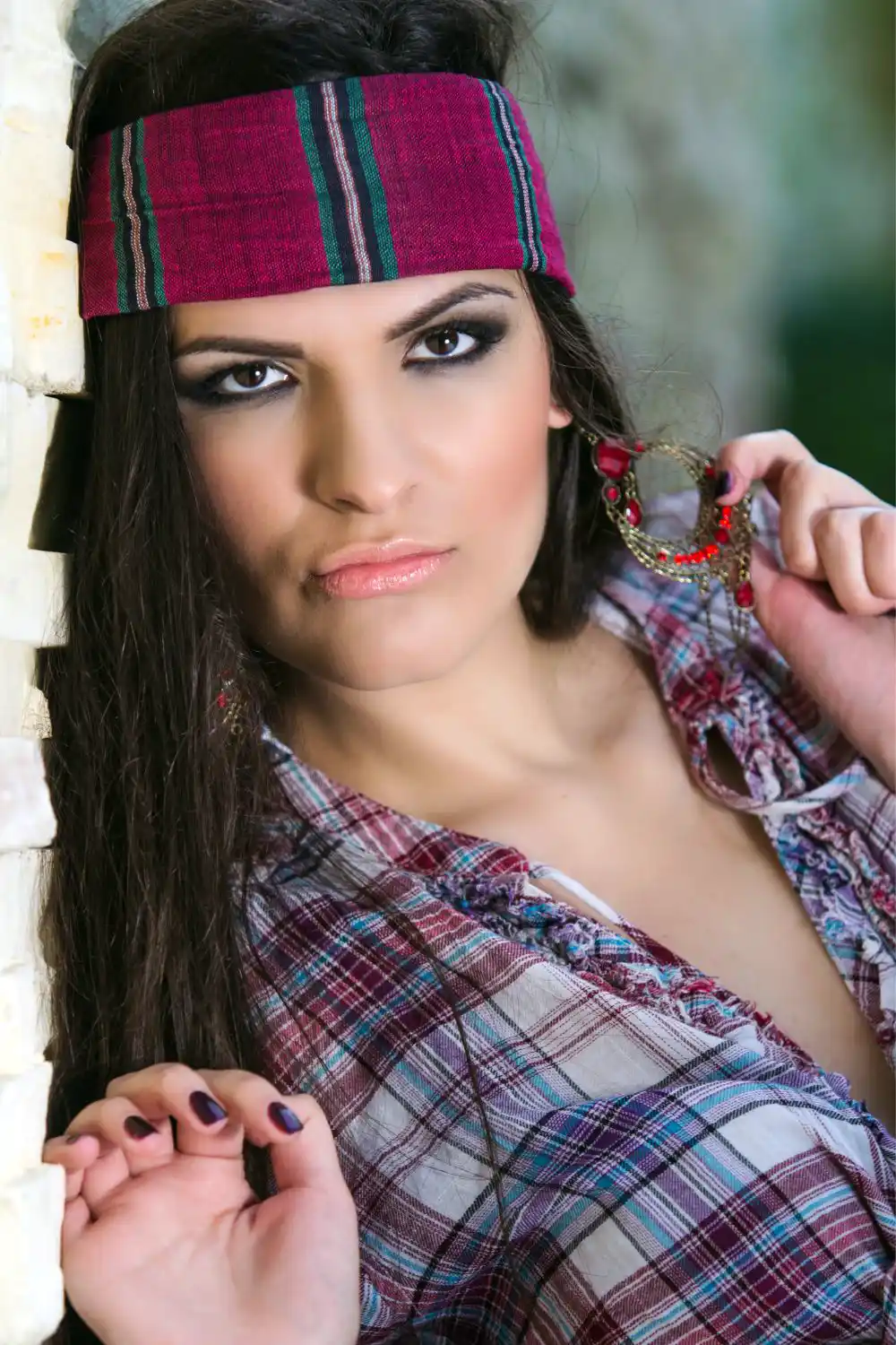 Young brunette woman with a headband in her hair