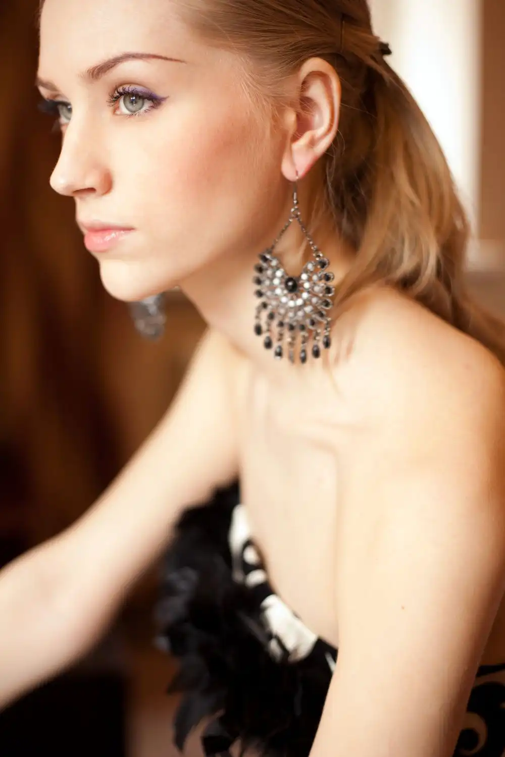 beautiful woman with big earrings