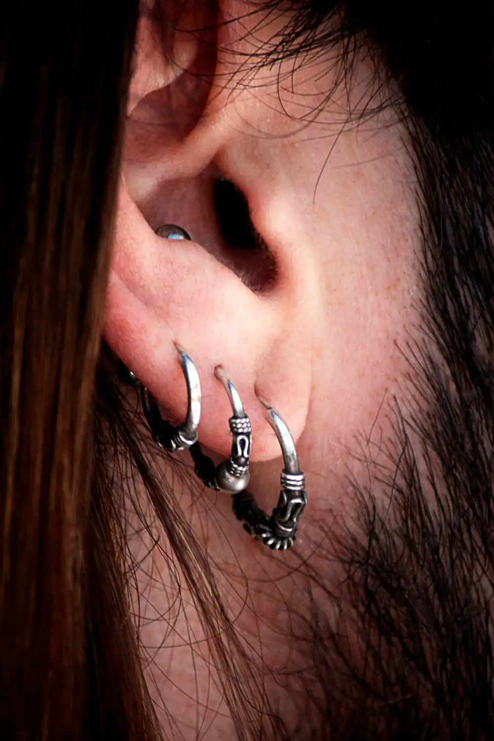three ear-rings