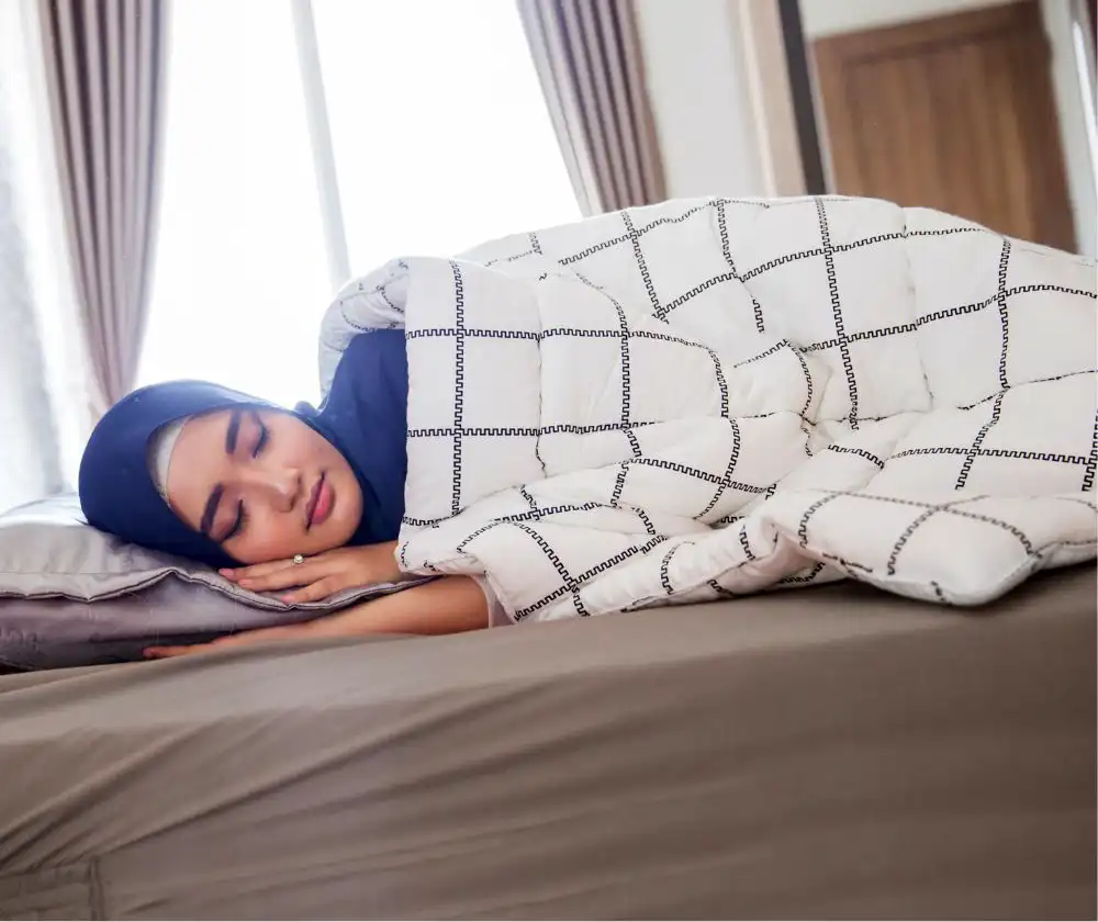 Woman Sleeping in Bed with head covering