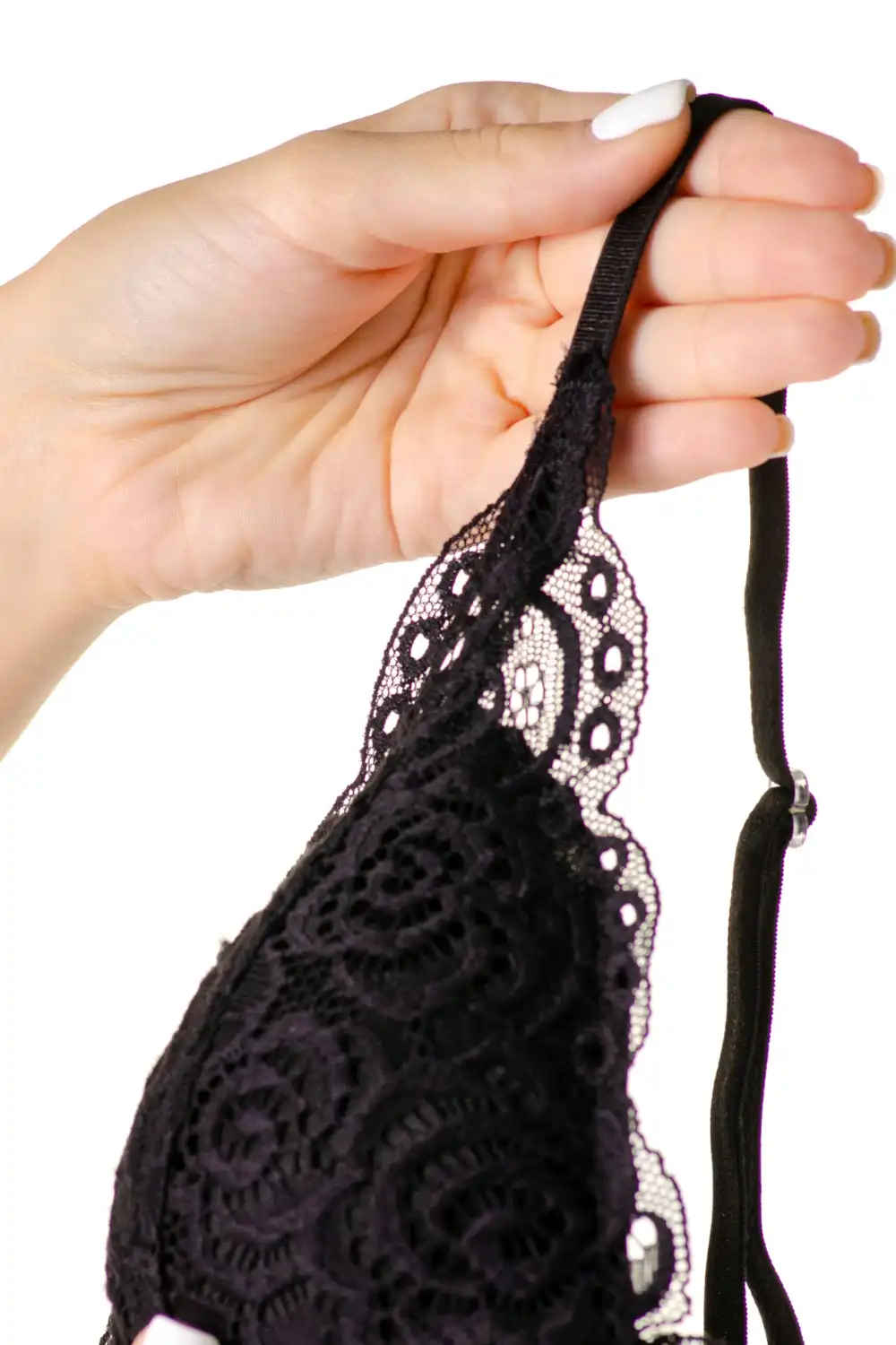 Black lace bra lace in hand pattern