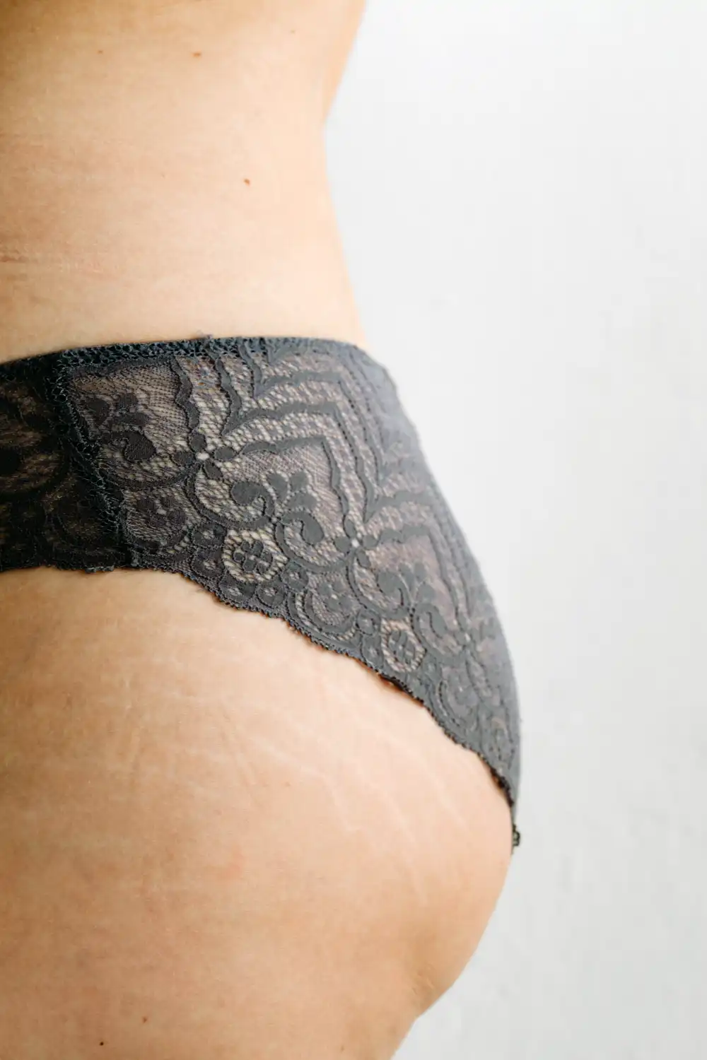Lady wearing black lace underwear